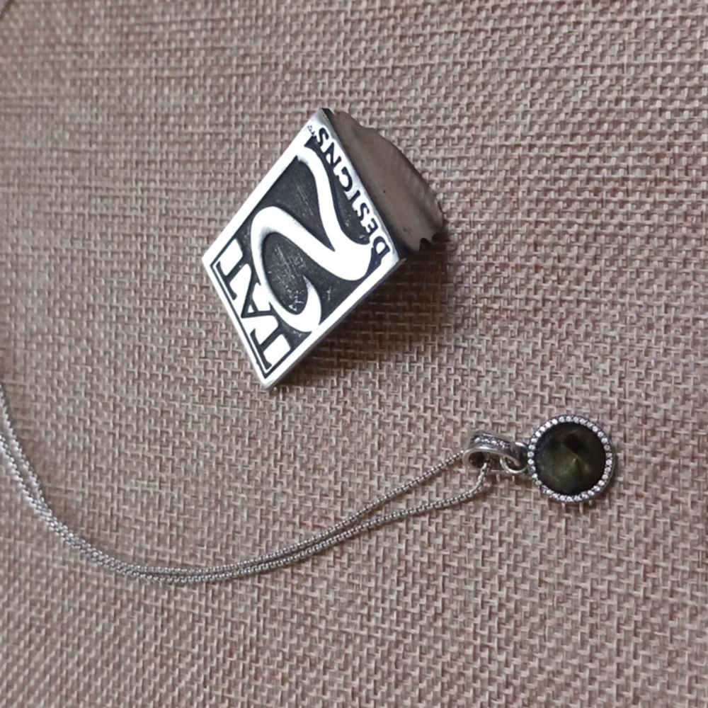 Tat2 charm necklace silver tone